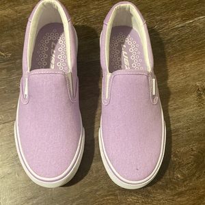Light purple with white inside slip ones. Lugz. Size 5.5 women’s. Never worn